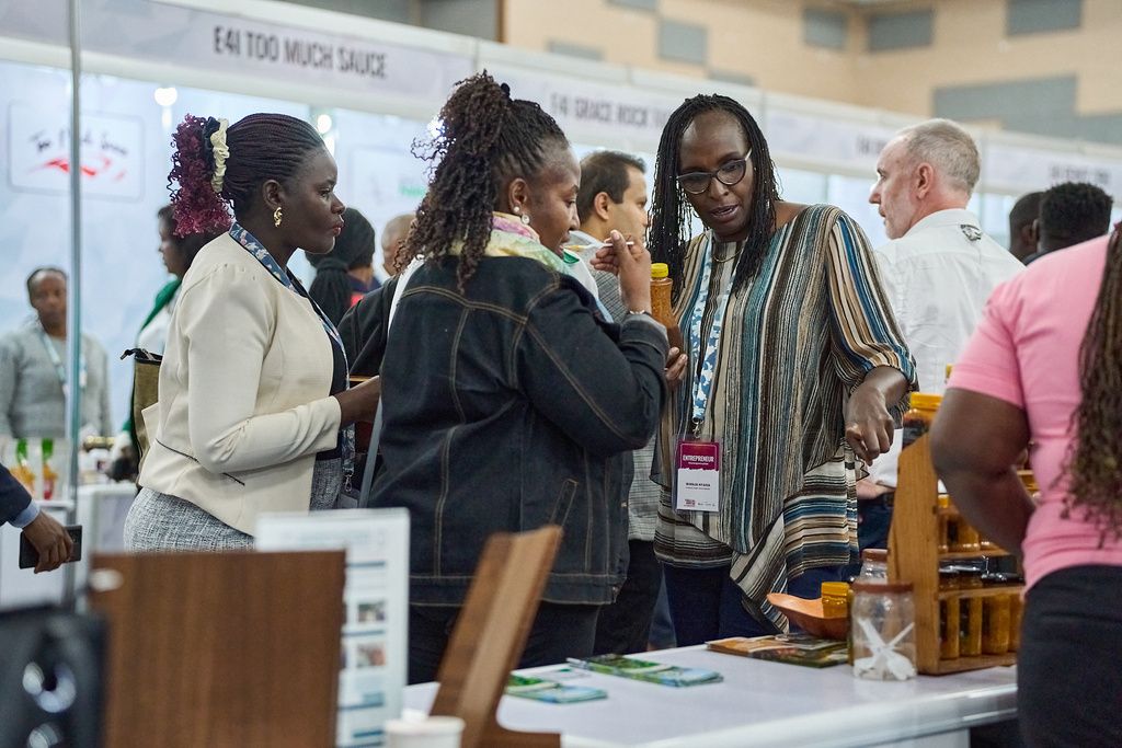 Changemakers meeting funders at an exhibition